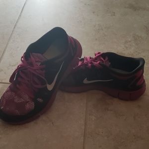 Purple Nike shoes